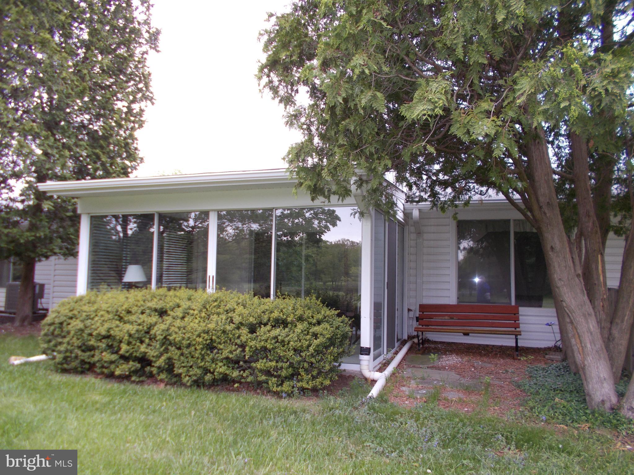 15135 Vantage Hill Road, Unit 7B Silver Spring, MD 20906 - Photo 2 of 36 Enclosed Porch/Sun Room overlooking Golf Course
