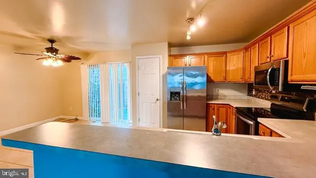 a view of a living room and bathroom
