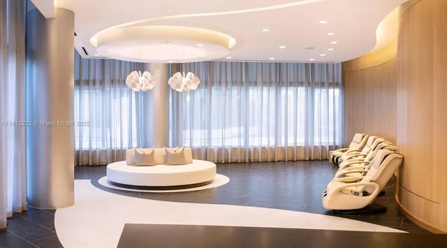 a dining room with furniture and window