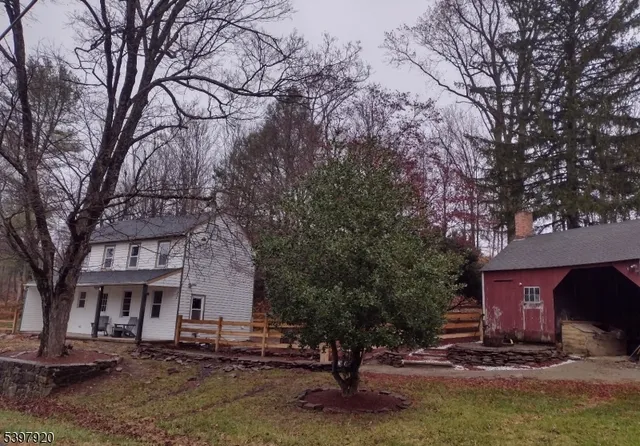 a house with trees in front of it