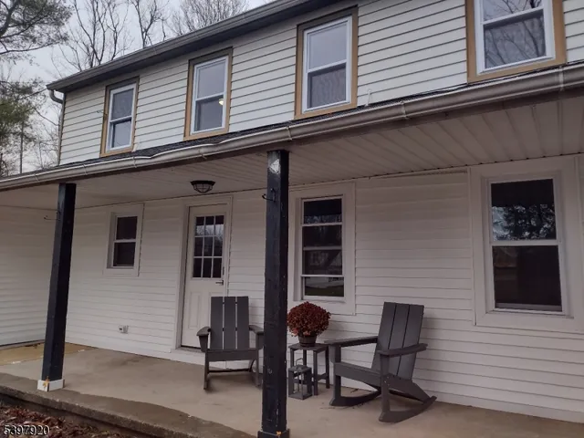a view of a building with outdoor seating