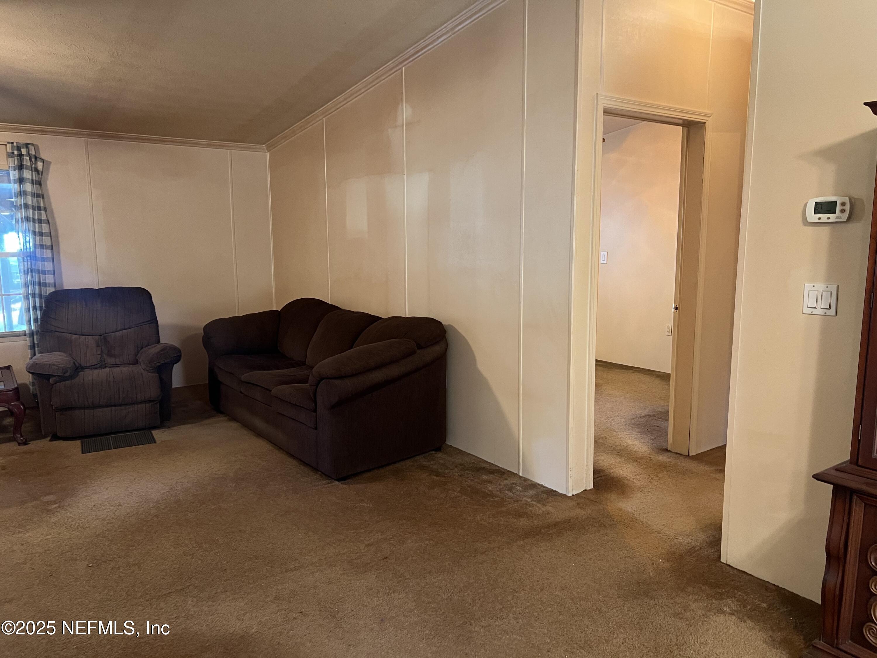 159 Keystone Road Palatka, FL 32177 - Photo 20 of 36 a living room with furniture and a couch