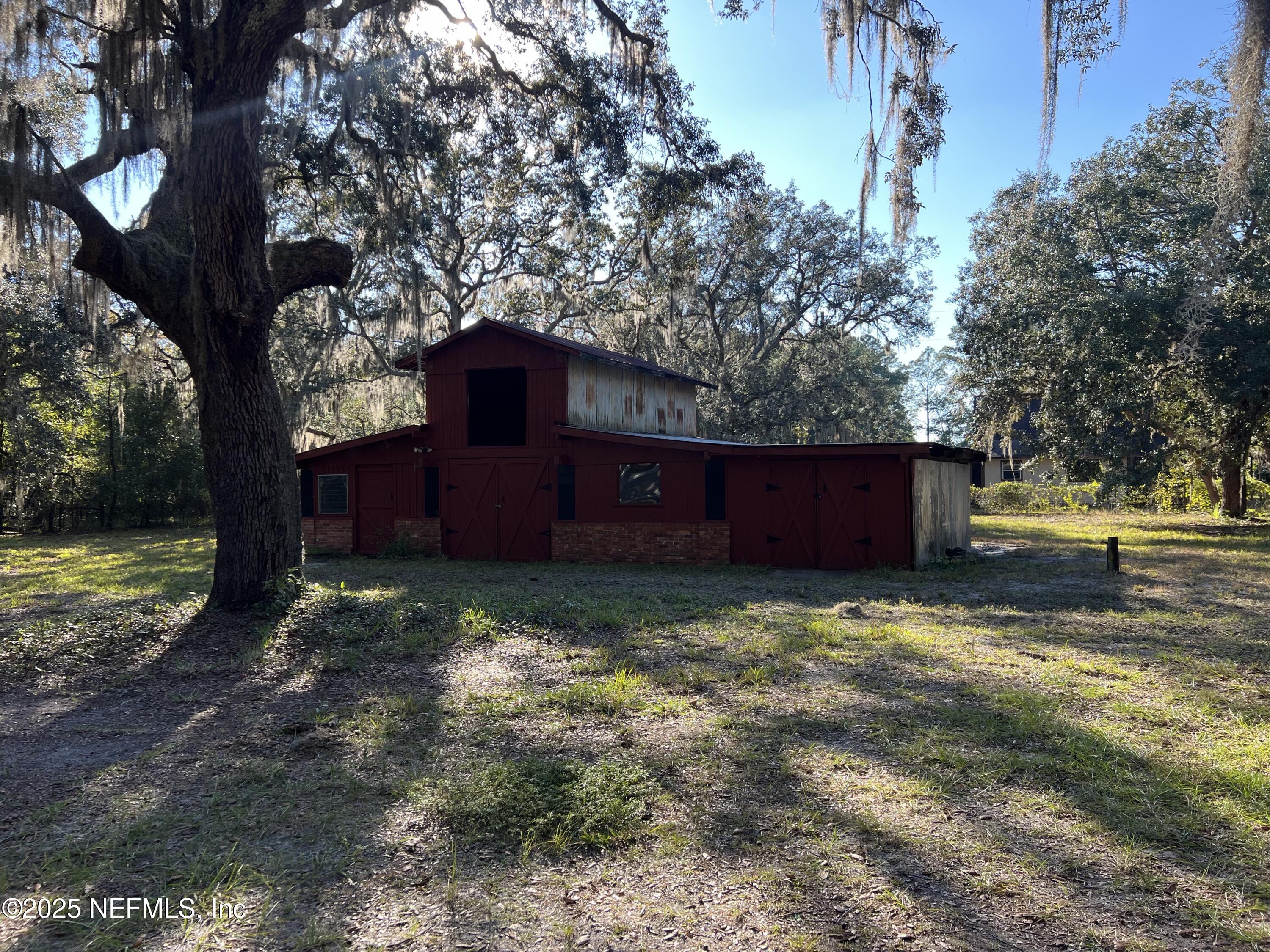 159 Keystone Road Palatka, FL 32177 - Photo 32 of 36 a yard with trees in the background