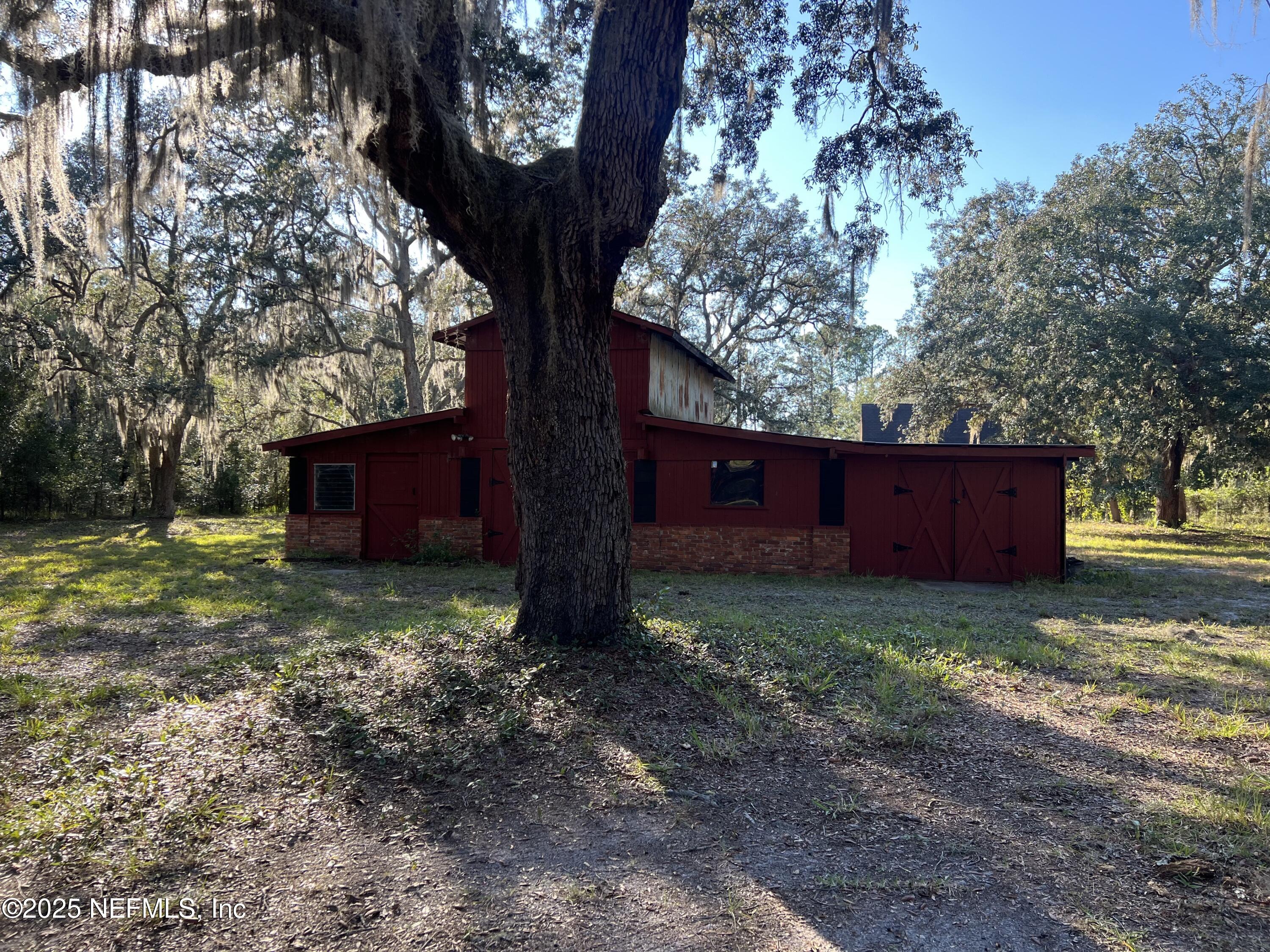 159 Keystone Road Palatka, FL 32177 - Photo 33 of 36 a view of a yard with large tree