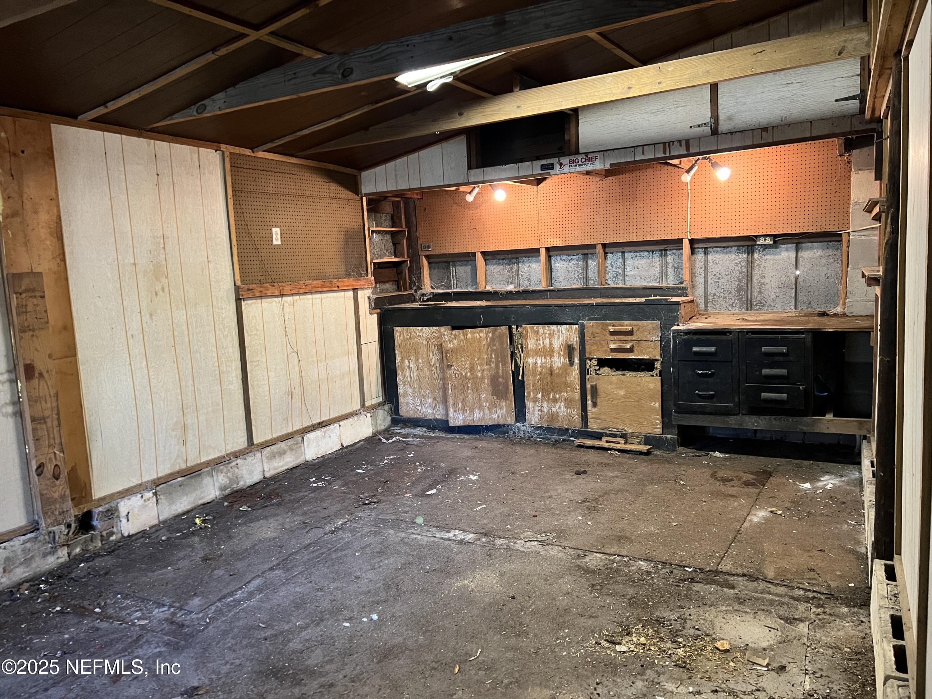 159 Keystone Road Palatka, FL 32177 - Photo 35 of 36 a view of an empty room with window and stairs