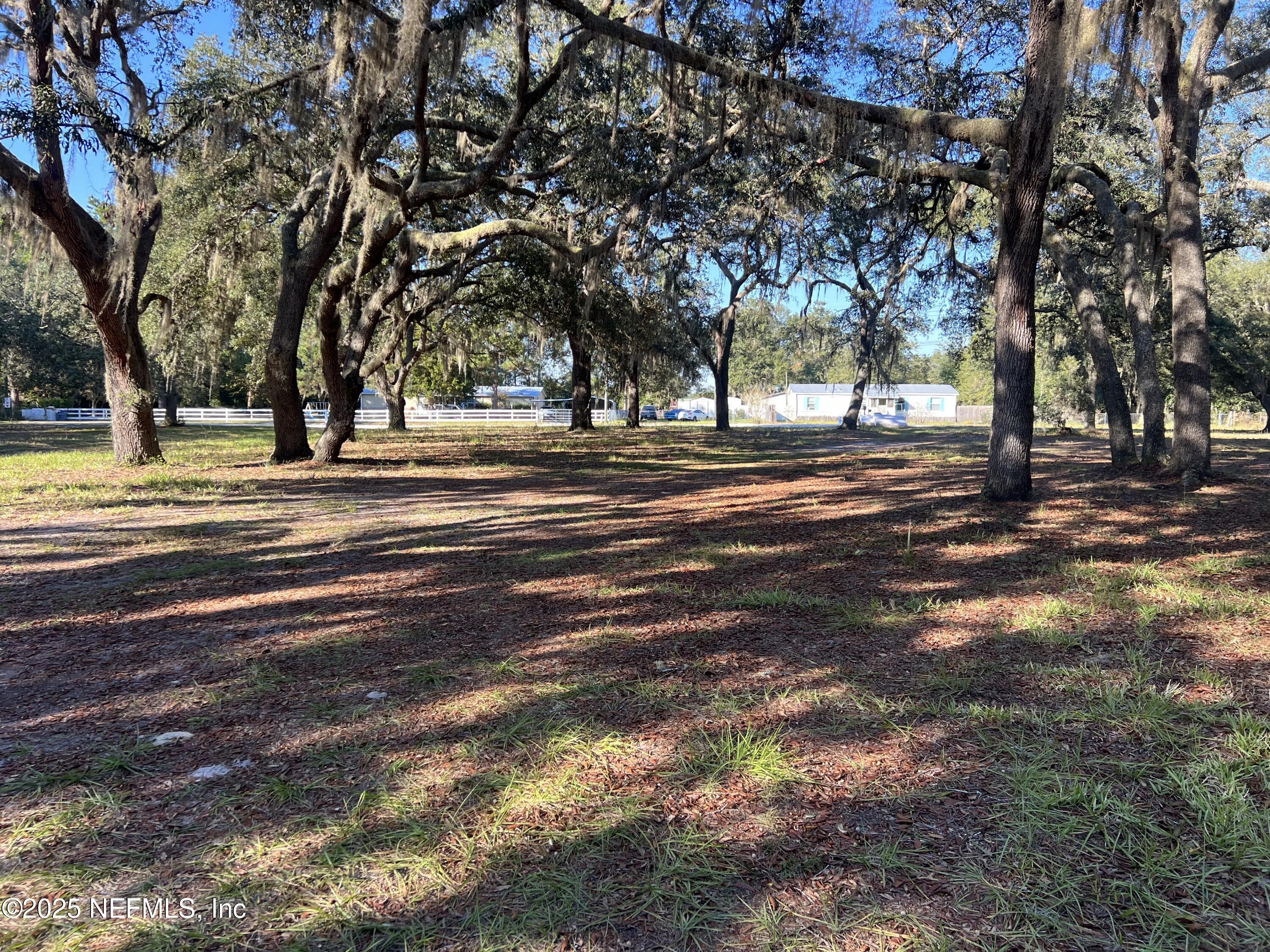 159 Keystone Road Palatka, FL 32177 - Photo 9 of 36 a view of a town with trees