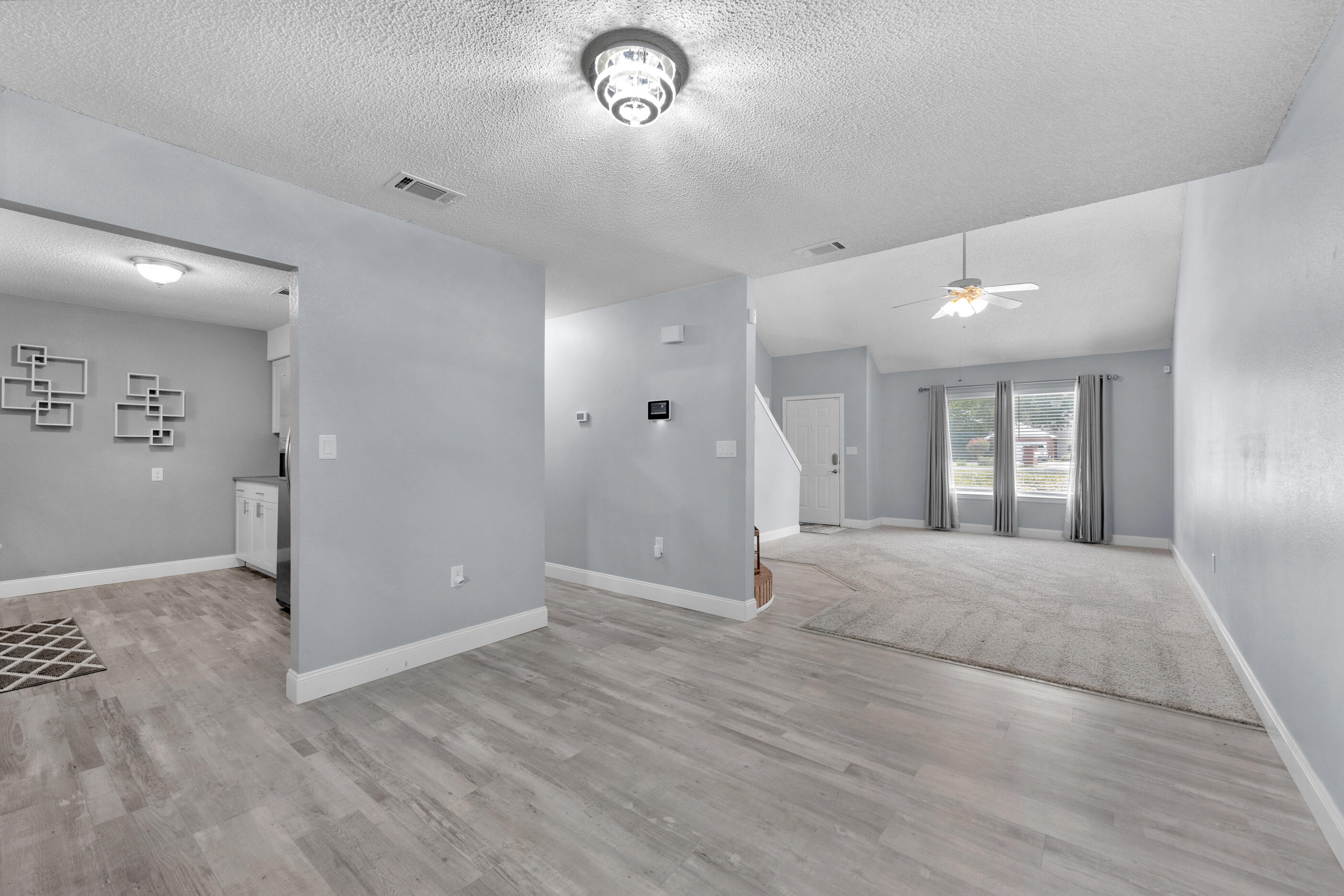 809 Valley Road Crestview, FL 32539 - Photo 11 of 24 an empty room with closet and windows