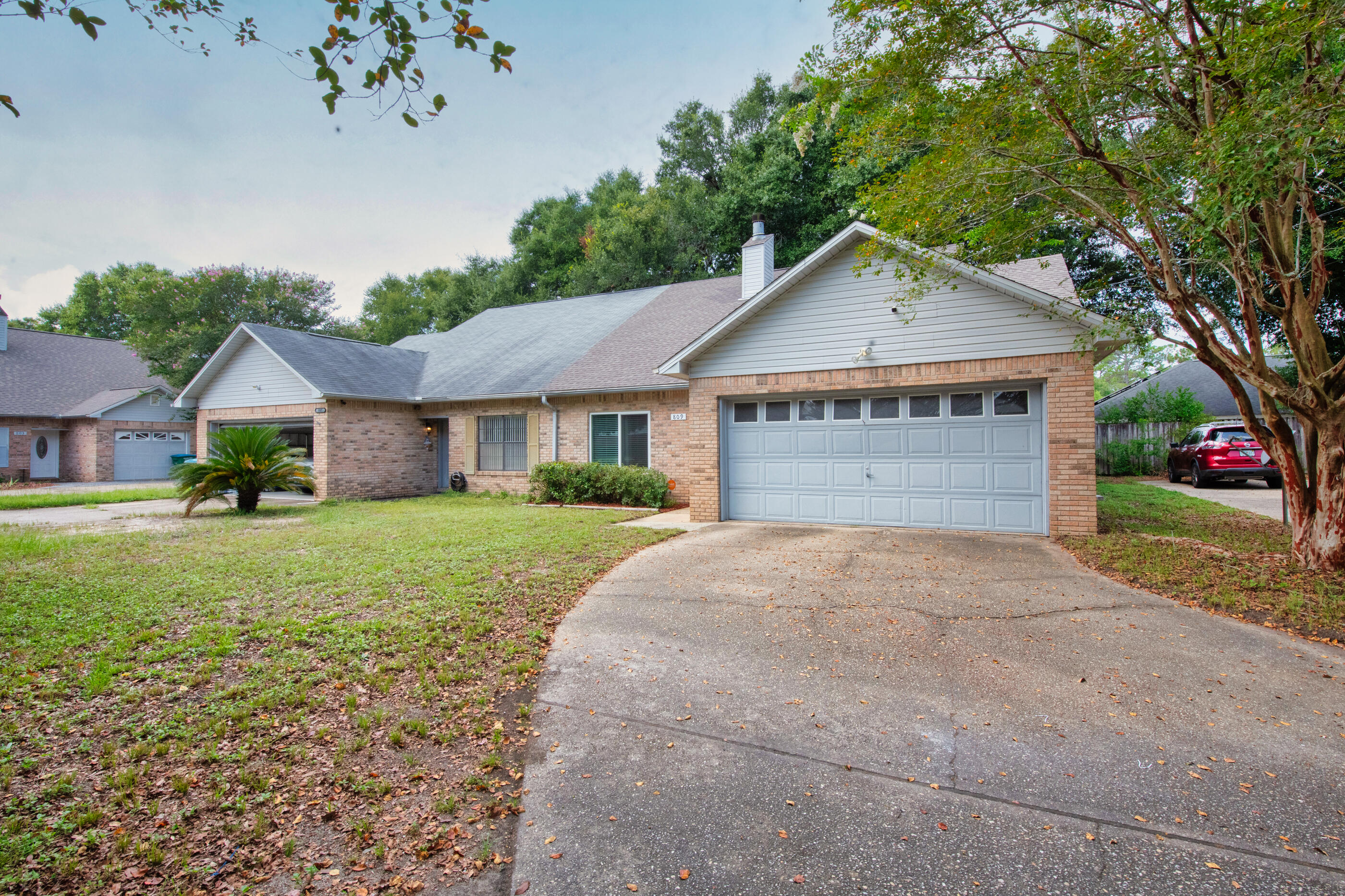 809 Valley Road Crestview, FL 32539 - Photo 24 of 24 a front view of a house with a yard and garage