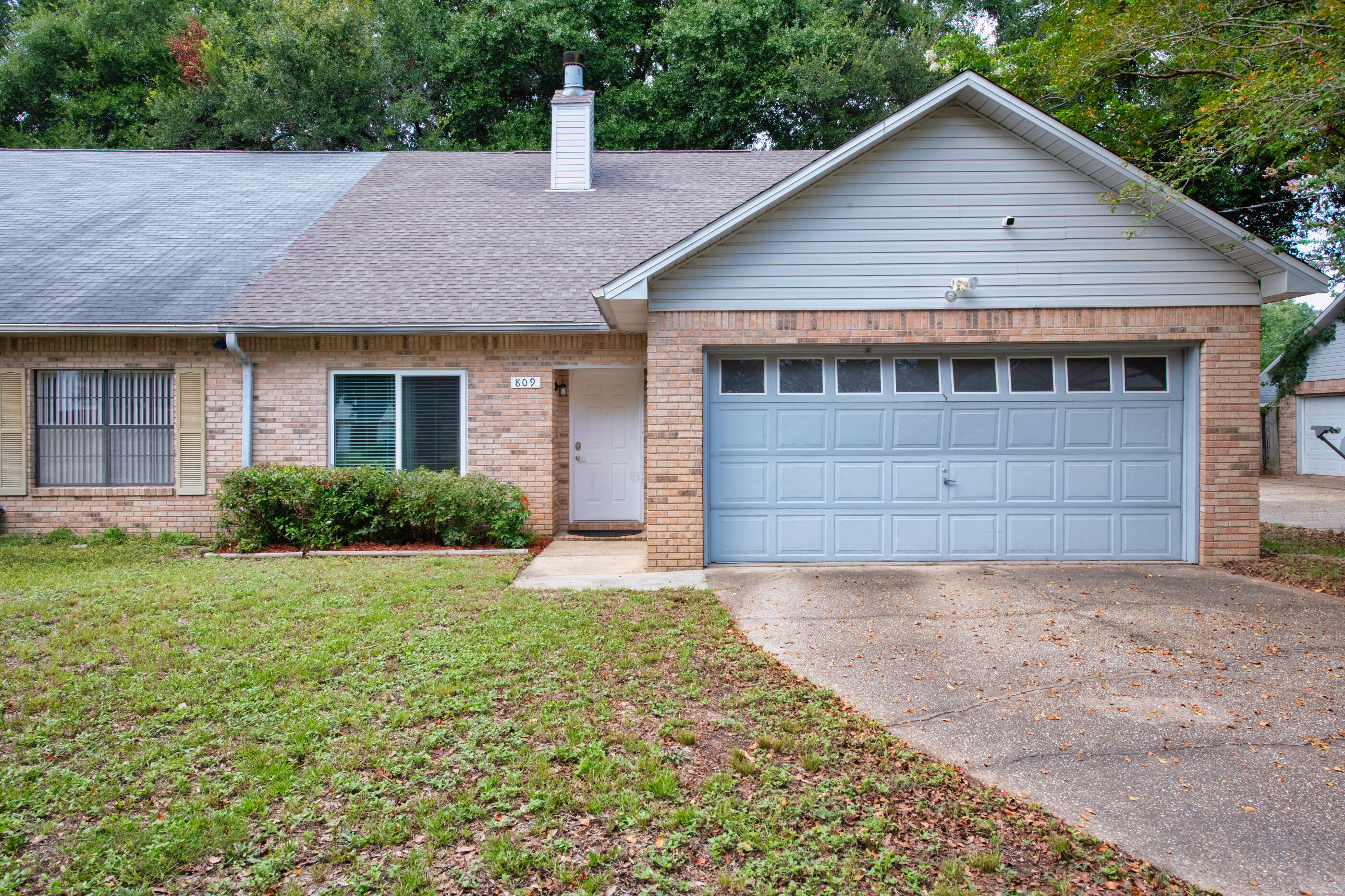 809 Valley Road Crestview, FL 32539 - Photo 5 of 24 a view of house with a yard and garage