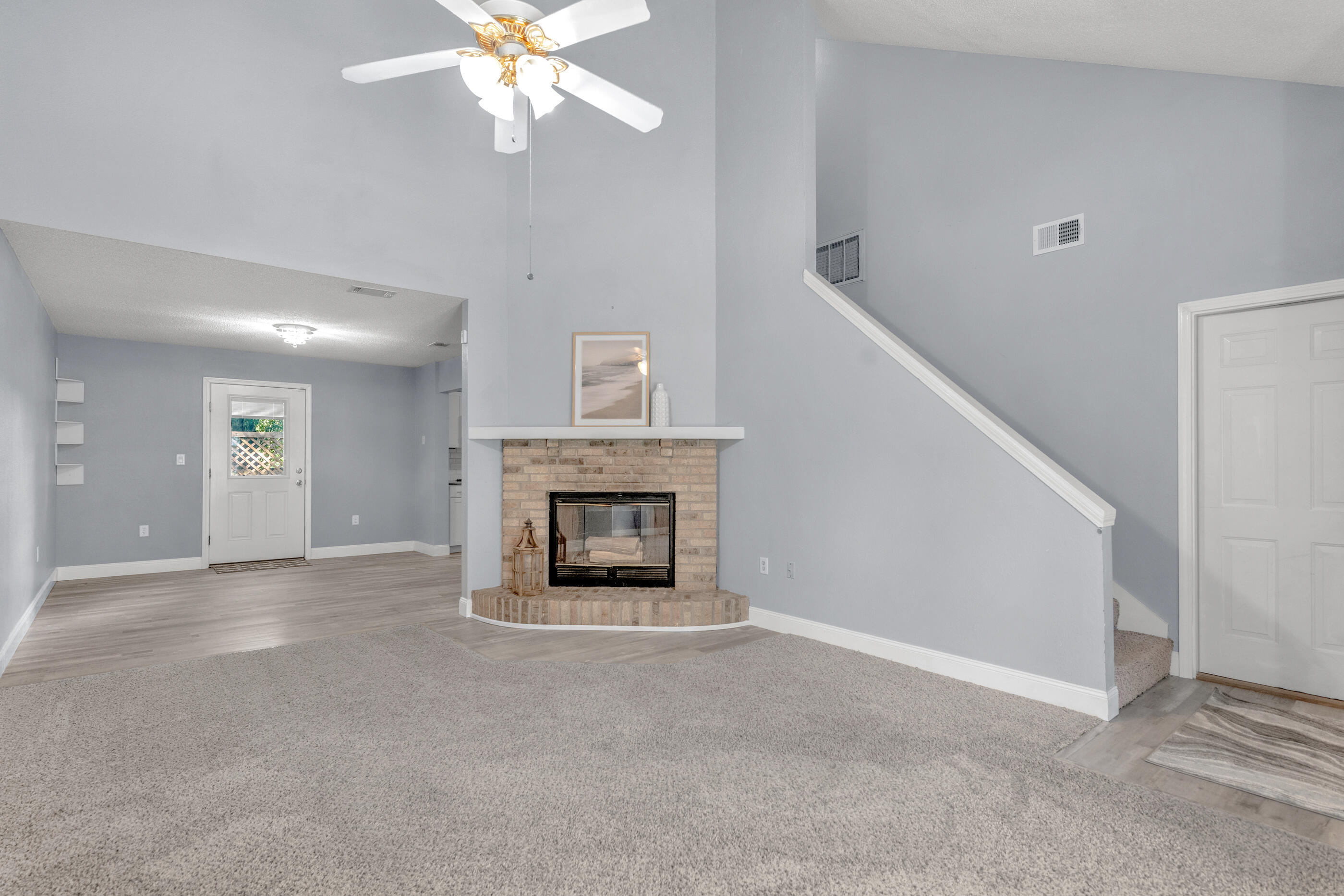 809 Valley Road Crestview, FL 32539 - Photo 7 of 24 a view of an empty room with a fireplace