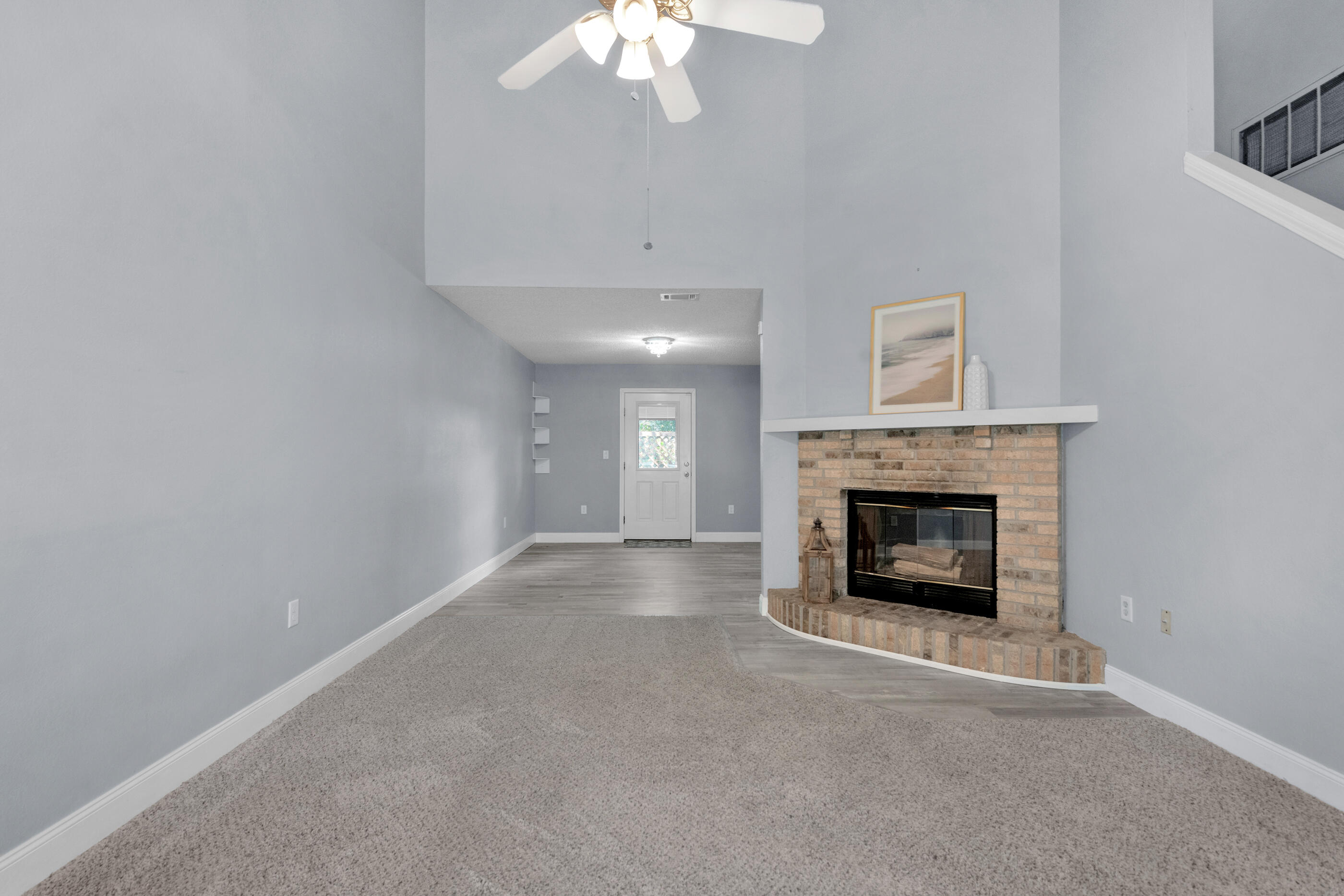 809 Valley Road Crestview, FL 32539 - Photo 9 of 24 a view of an empty room with a fireplace