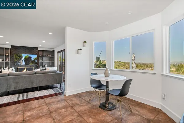 a living room with furniture and a table