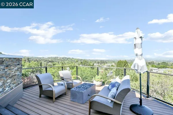 a view of a terrace with furniture