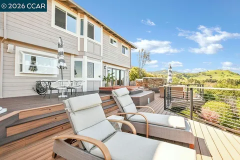 a view of a terrace with furniture