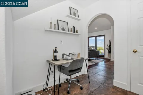 a view of a livingroom with furniture and wooden floor
