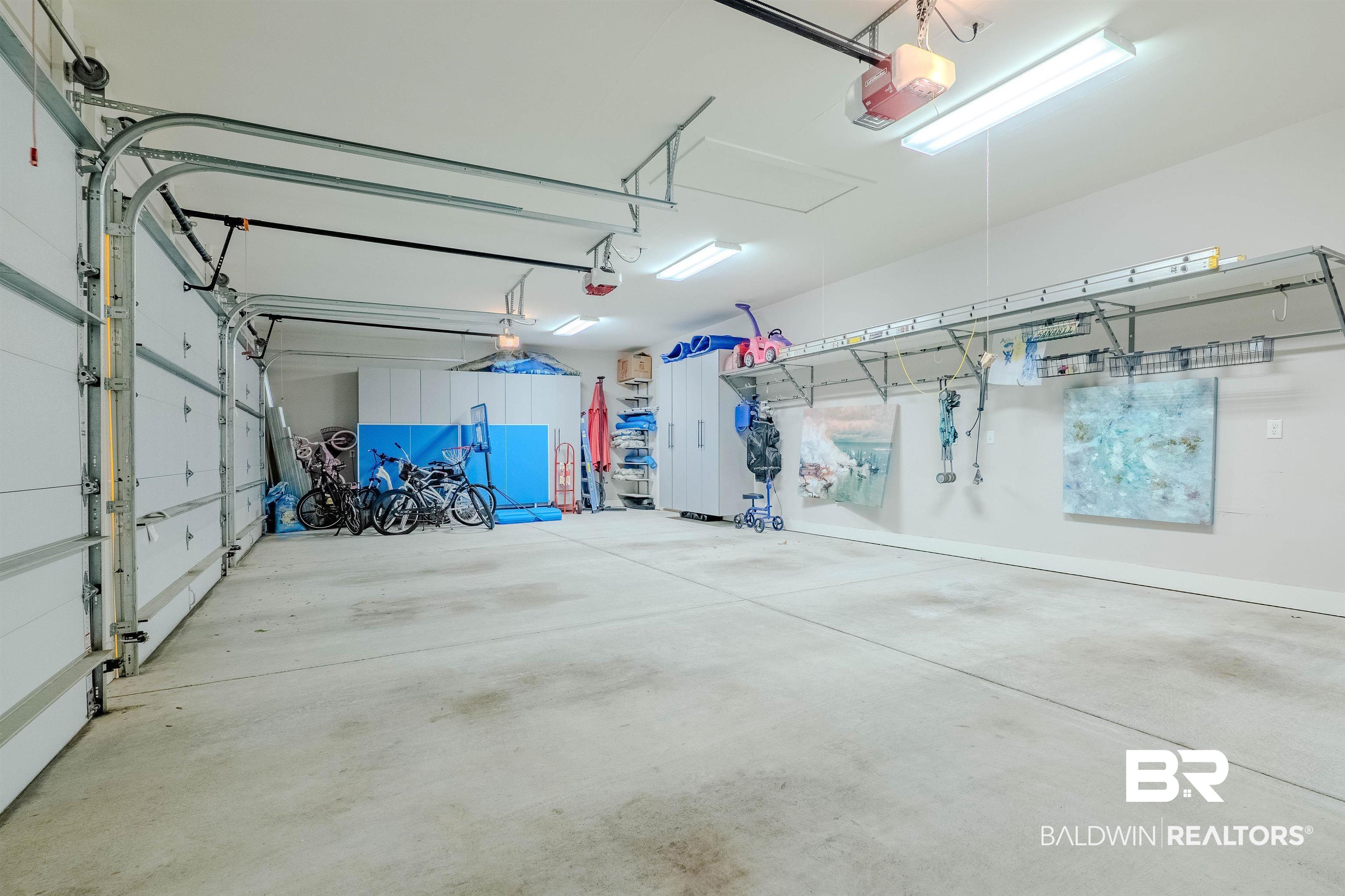 708 Manning Place Fairhope, AL 36532 - Photo 53 of 58 Garage with a garage door opener