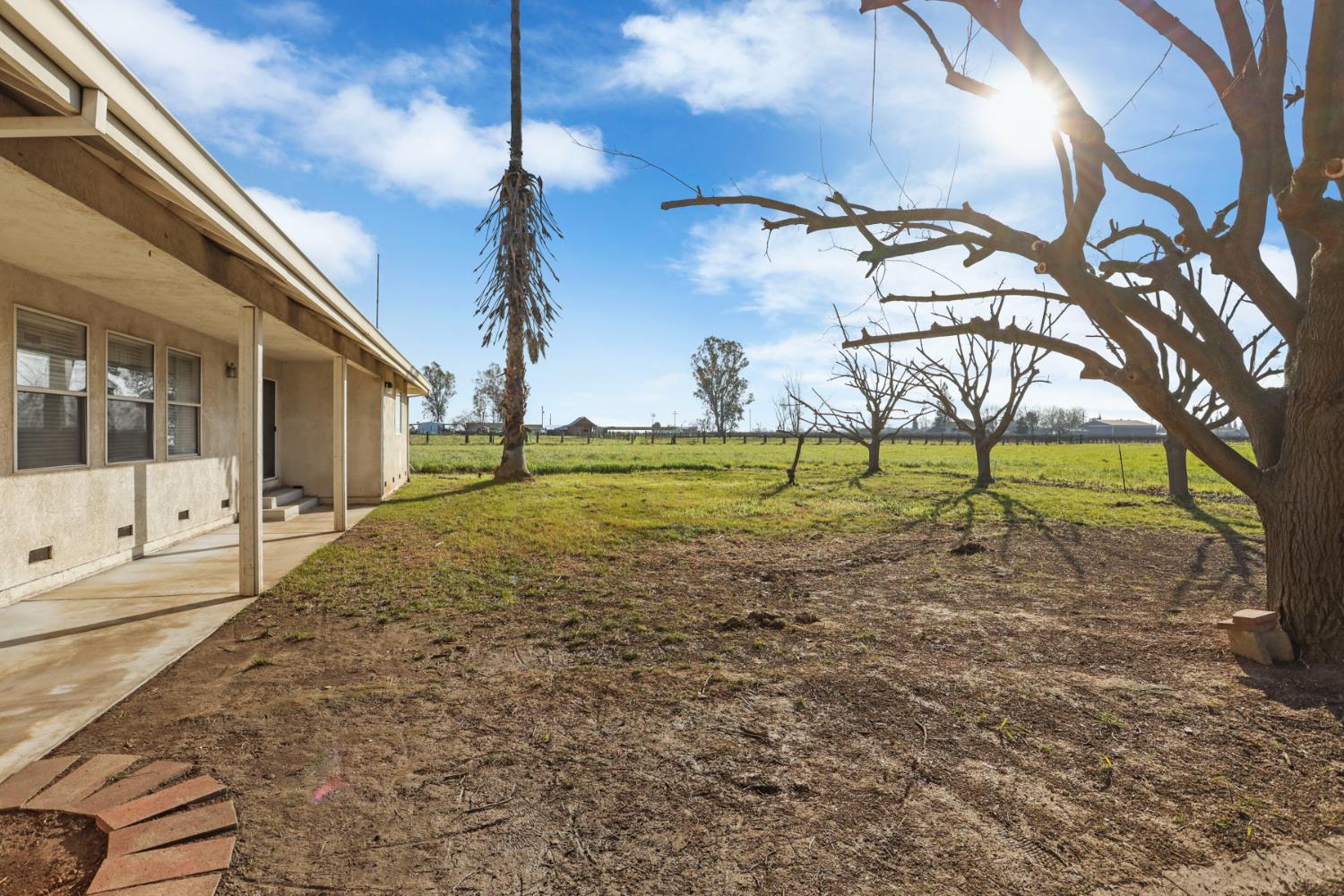 24257 North Pearl Road Acampo, CA 95220 - Photo 13 of 41 a view of a house with a yard