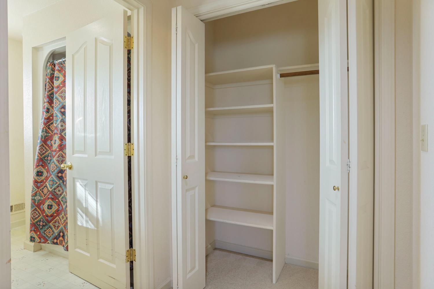 24257 North Pearl Road Acampo, CA 95220 - Photo 40 of 41 a view of walk in closet with window