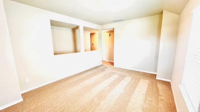 a view of a big room with wooden floor