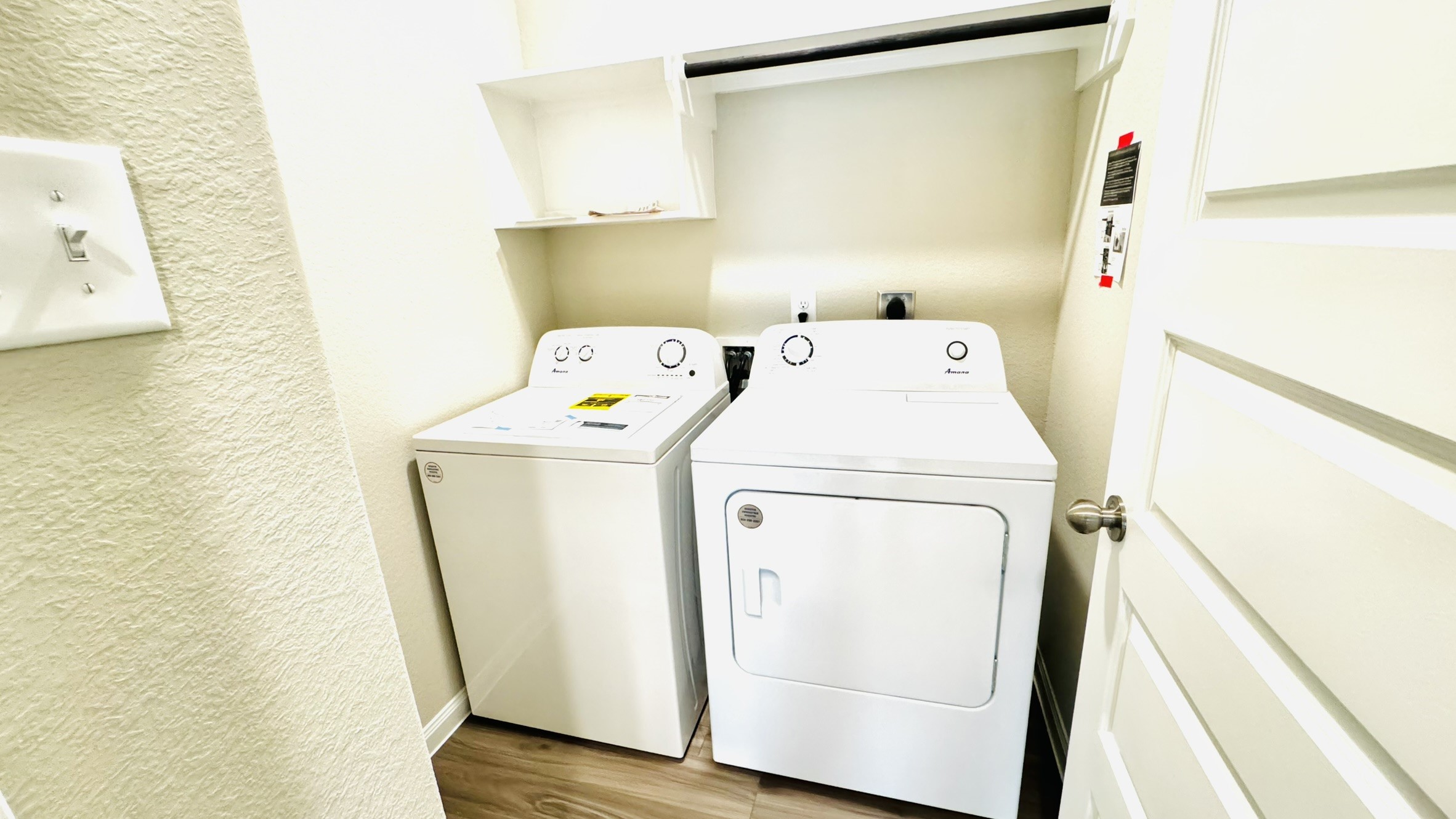 2423 Bluefish Court Conroe, TX 77384 - Photo 26 of 30 a utility room with dryer and washer