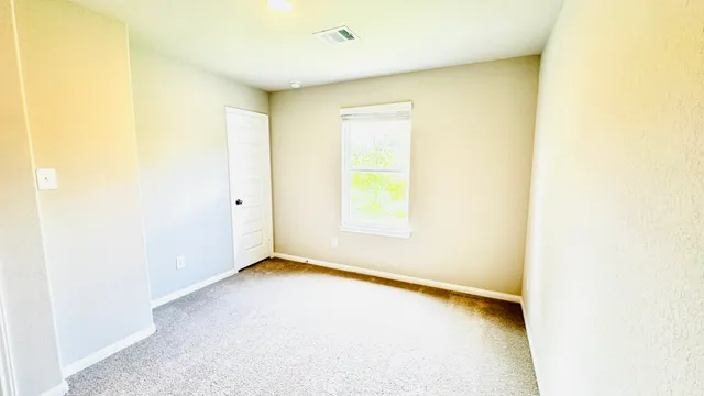 an empty room with a window