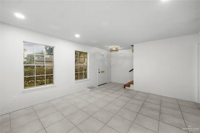 an empty room with windows