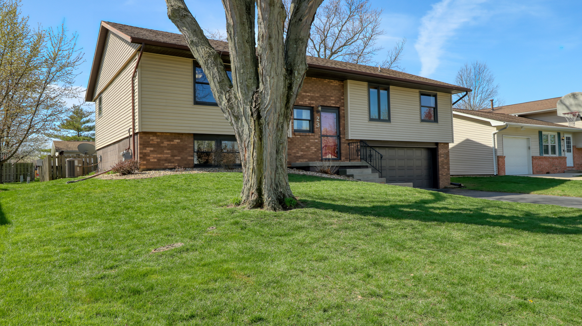 23 Cedar Court Bloomington, IL 61701 - Photo 2 of 36 a view of a house with a yard