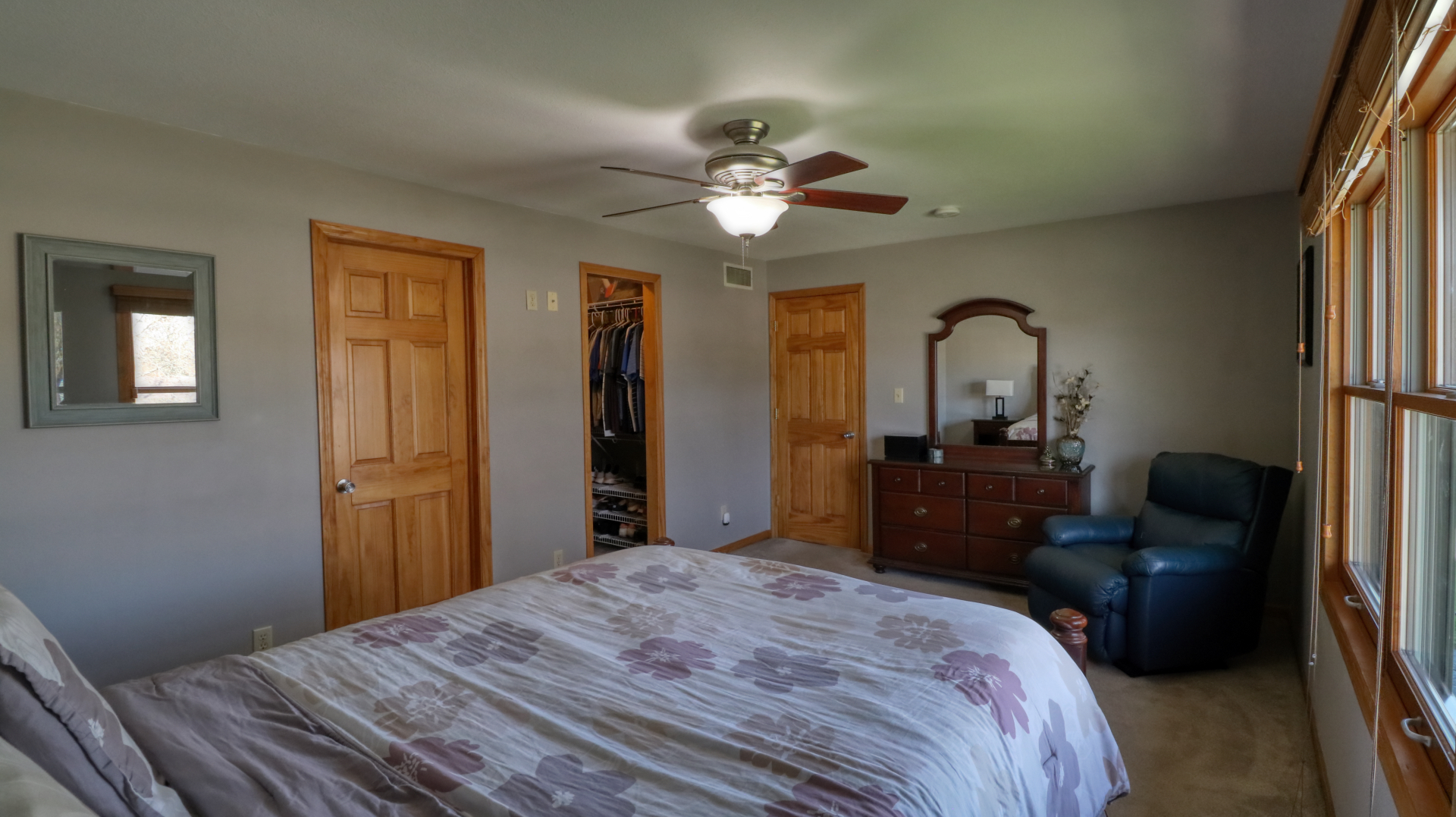 23 Cedar Court Bloomington, IL 61701 - Photo 24 of 36 a bedroom with a bed and a chandelier