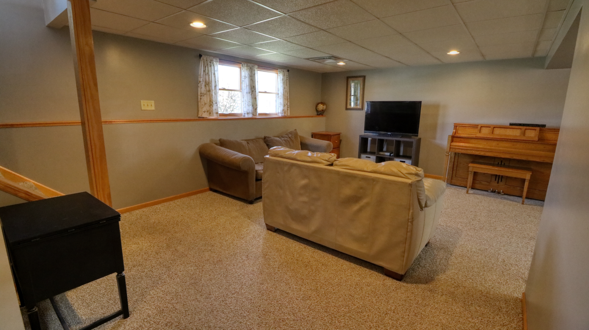 23 Cedar Court Bloomington, IL 61701 - Photo 27 of 36 a living room with furniture and a flat screen tv