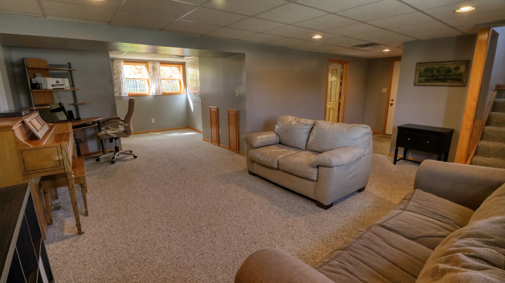 23 Cedar Court Bloomington, IL 61701 - Photo 28 of 36 a living room with furniture and a fireplace