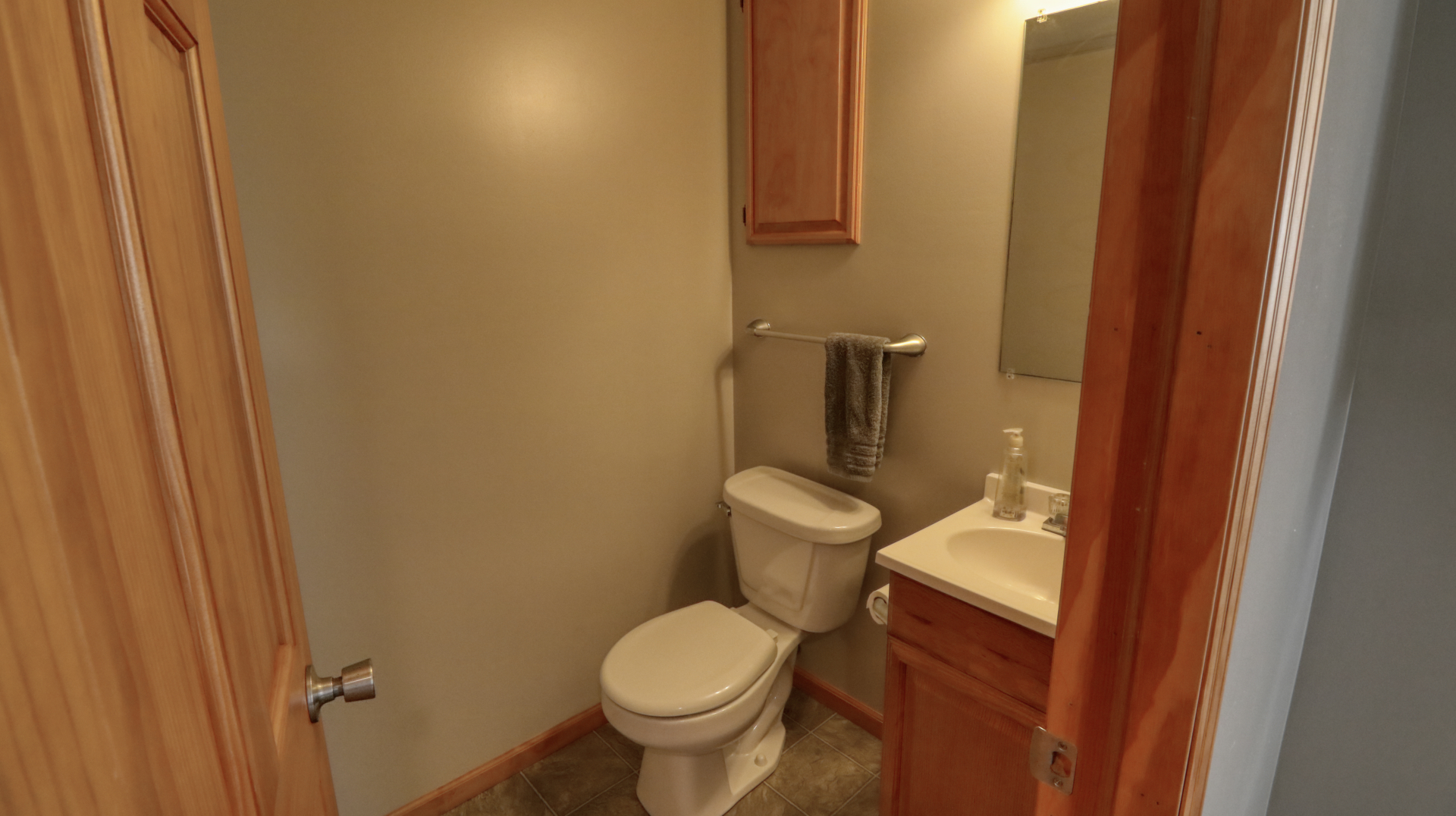 23 Cedar Court Bloomington, IL 61701 - Photo 30 of 36 a white toilet sitting next to a shower
