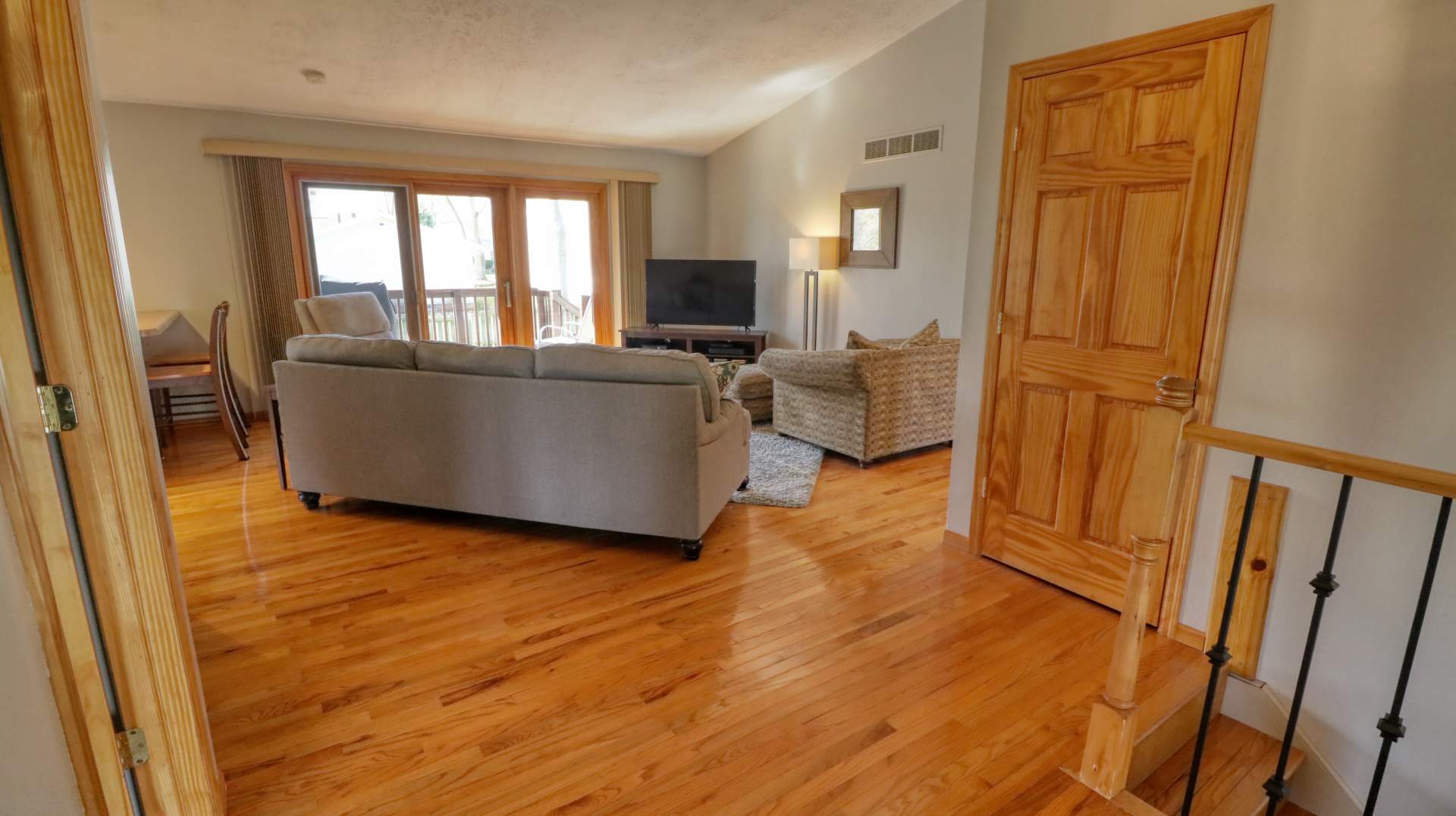 23 Cedar Court Bloomington, IL 61701 - Photo 6 of 36 a living room with furniture and a flat screen tv