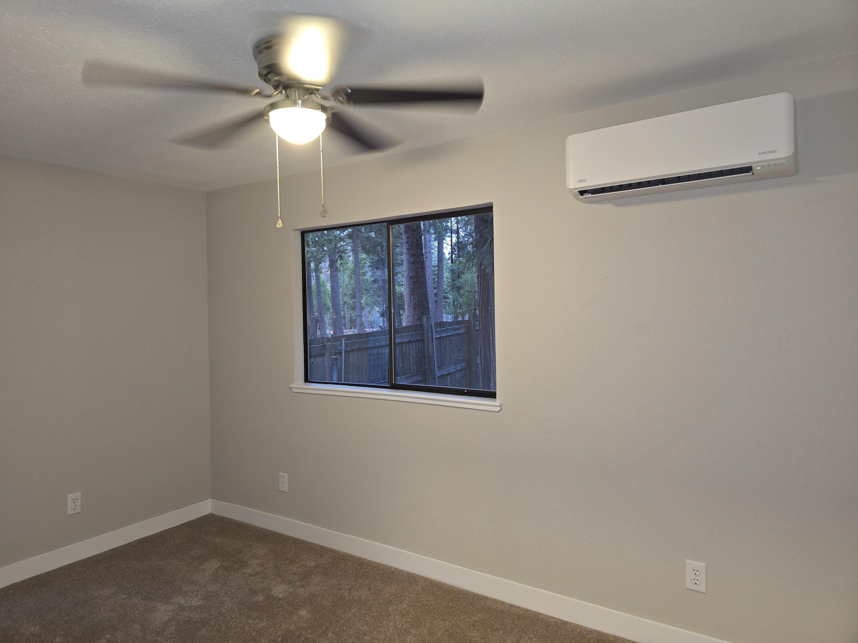 8353 Starlite Pines Road Shingletown, CA 96088 - Photo 16 of 30 a view of a livingroom with a fan