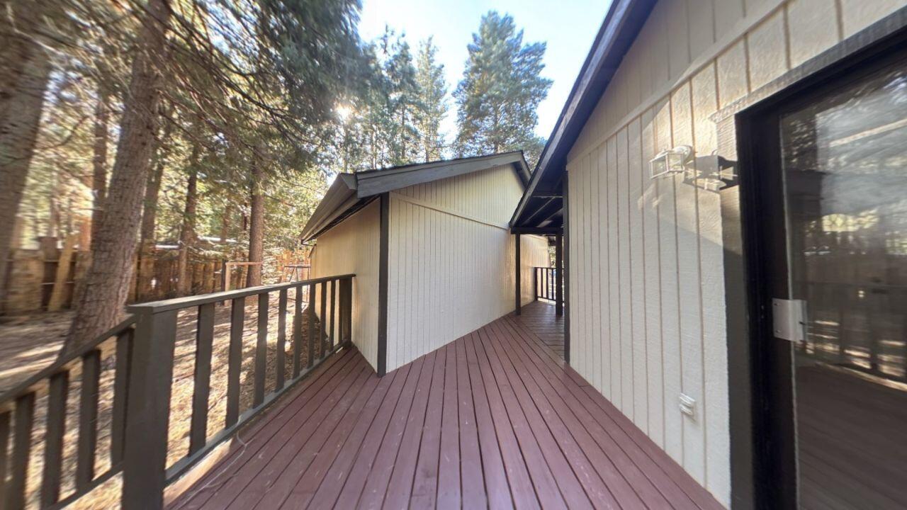 8353 Starlite Pines Road Shingletown, CA 96088 - Photo 20 of 30 a view of balcony with wooden floor