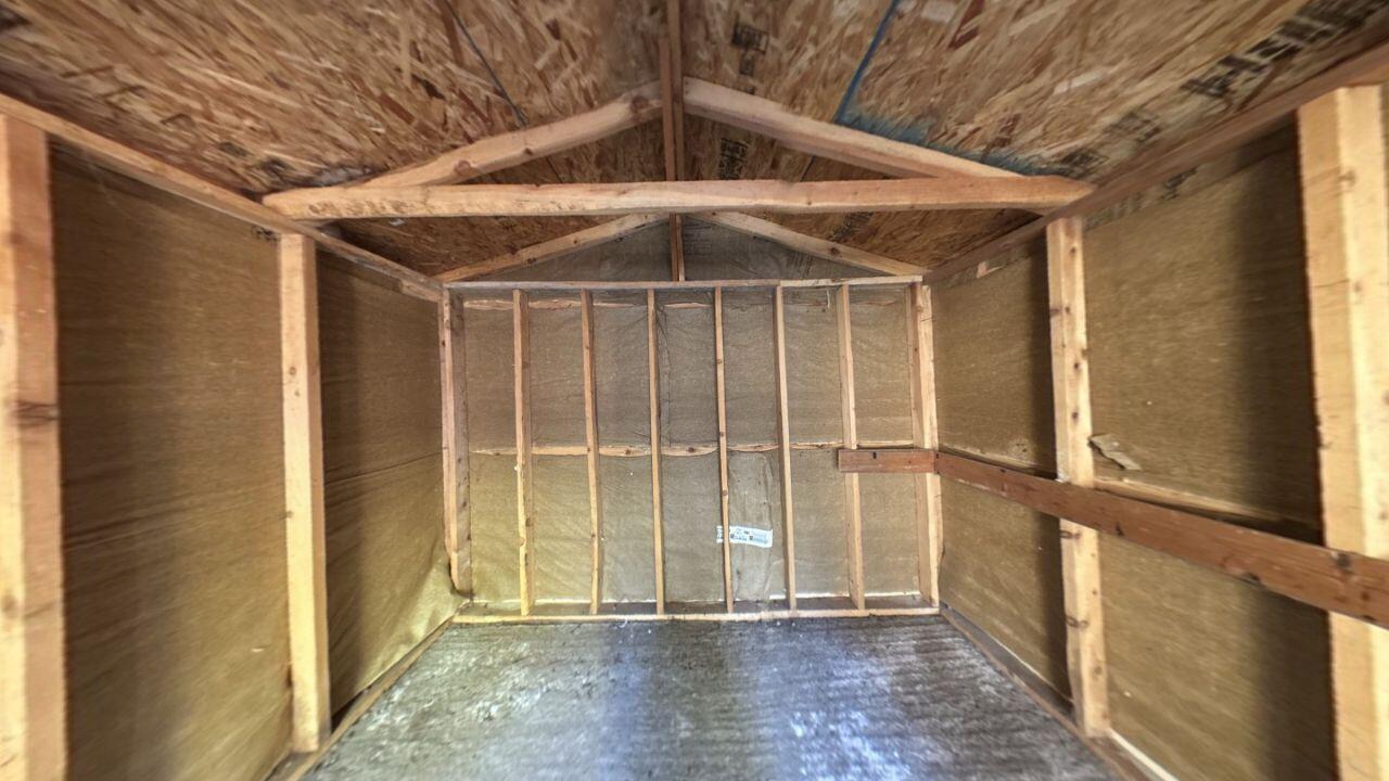 8353 Starlite Pines Road Shingletown, CA 96088 - Photo 29 of 30 a view of an empty room with wooden floor and a window