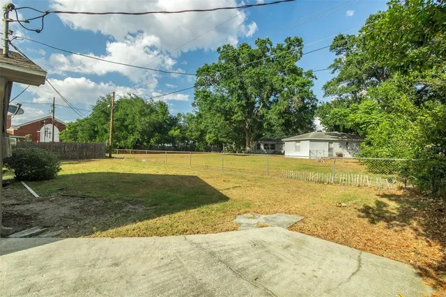 a view of a swimming pool with an outdoor space