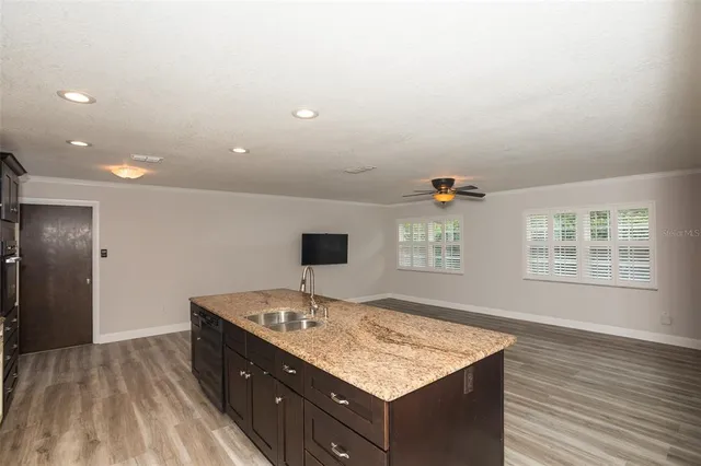 a bathroom with a sink a vanity and a mirror