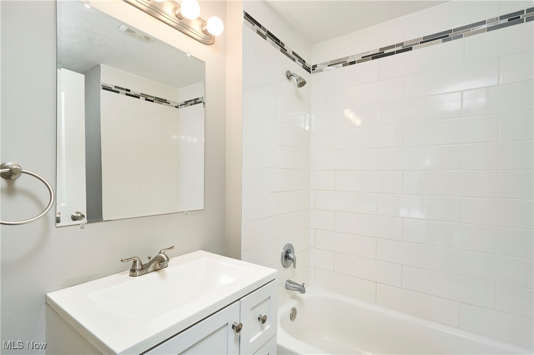 4226 Broadview Road Richfield, OH 44286 - Photo 11 of 24 Bathroom with shower / bath combination and vanity
