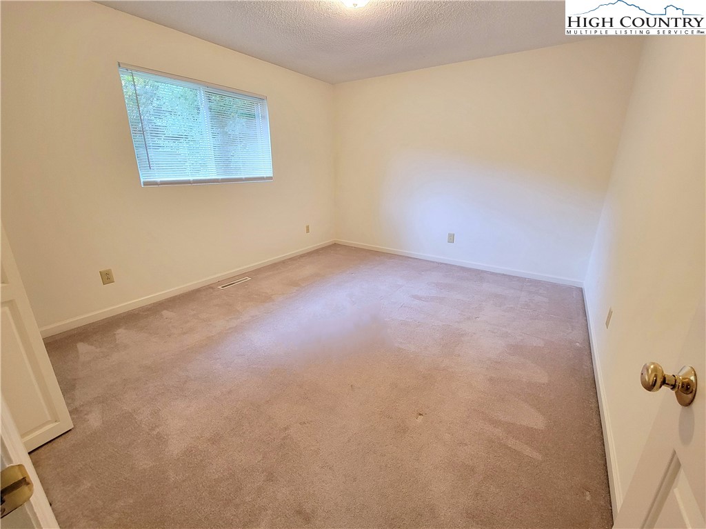 139 Wey Street Boone, NC 28607 - Photo 12 of 25 an empty room with a window