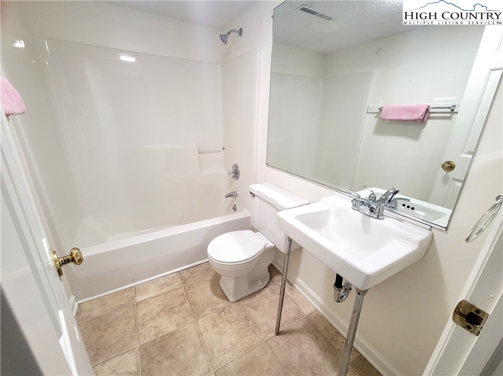 139 Wey Street Boone, NC 28607 - Photo 15 of 25 a bathroom with a sink toilet and shower