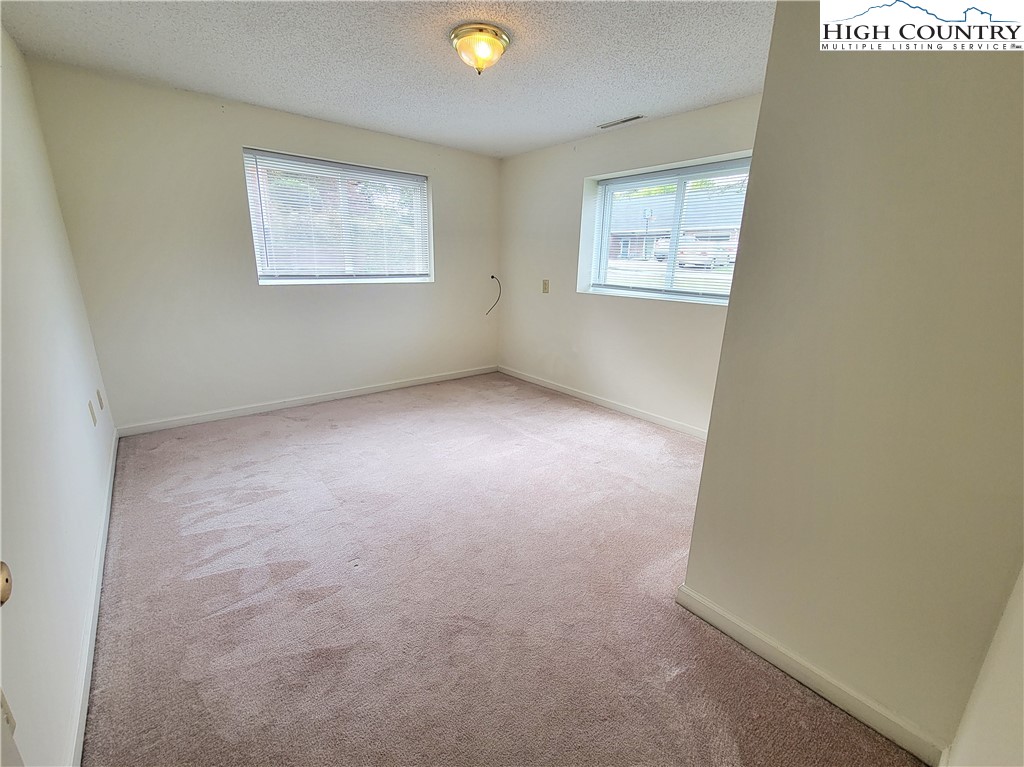 139 Wey Street Boone, NC 28607 - Photo 17 of 25 an empty room with windows