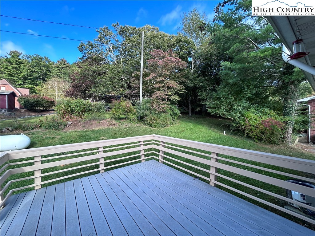 139 Wey Street Boone, NC 28607 - Photo 21 of 25 a view of outdoor space with deck and yard