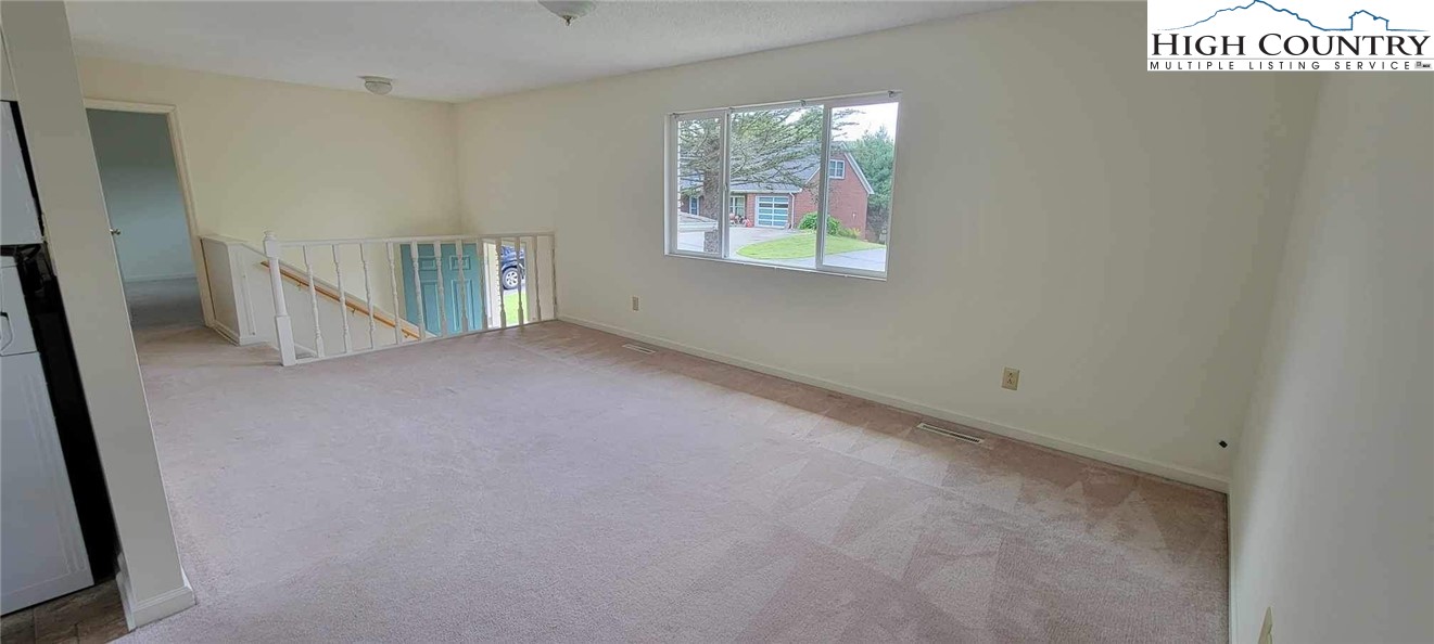 139 Wey Street Boone, NC 28607 - Photo 6 of 25 an empty room with windows
