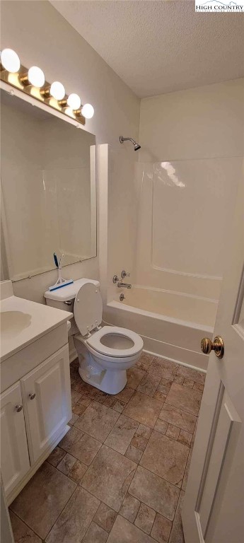 139 Wey Street Boone, NC 28607 - Photo 9 of 25 a bathroom with a granite countertop sink toilet a mirror and shower