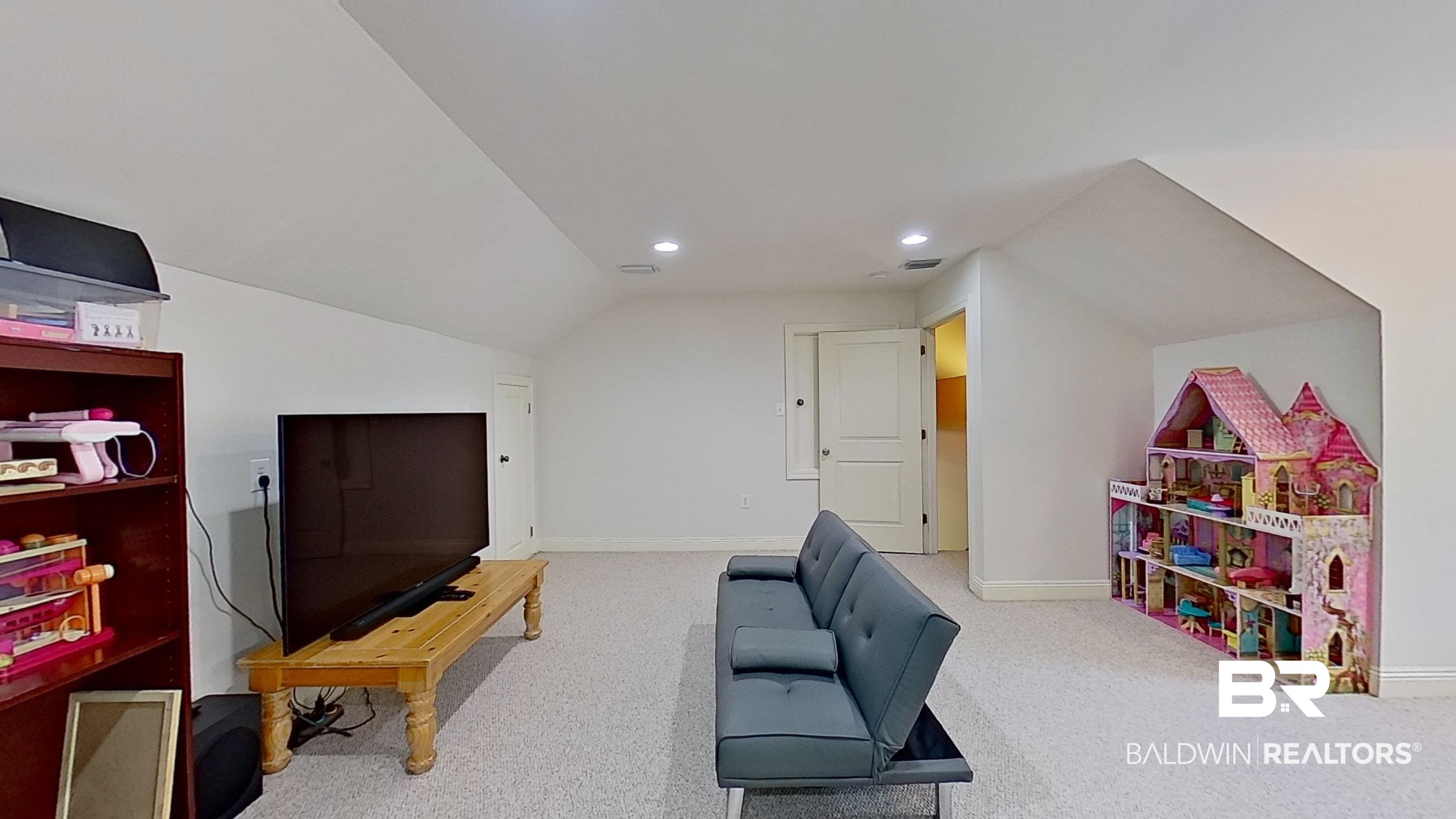 4340 Hamilton Oaks Lane Mobile, AL 36695 - Photo 32 of 51 Game room with lofted ceiling and carpet