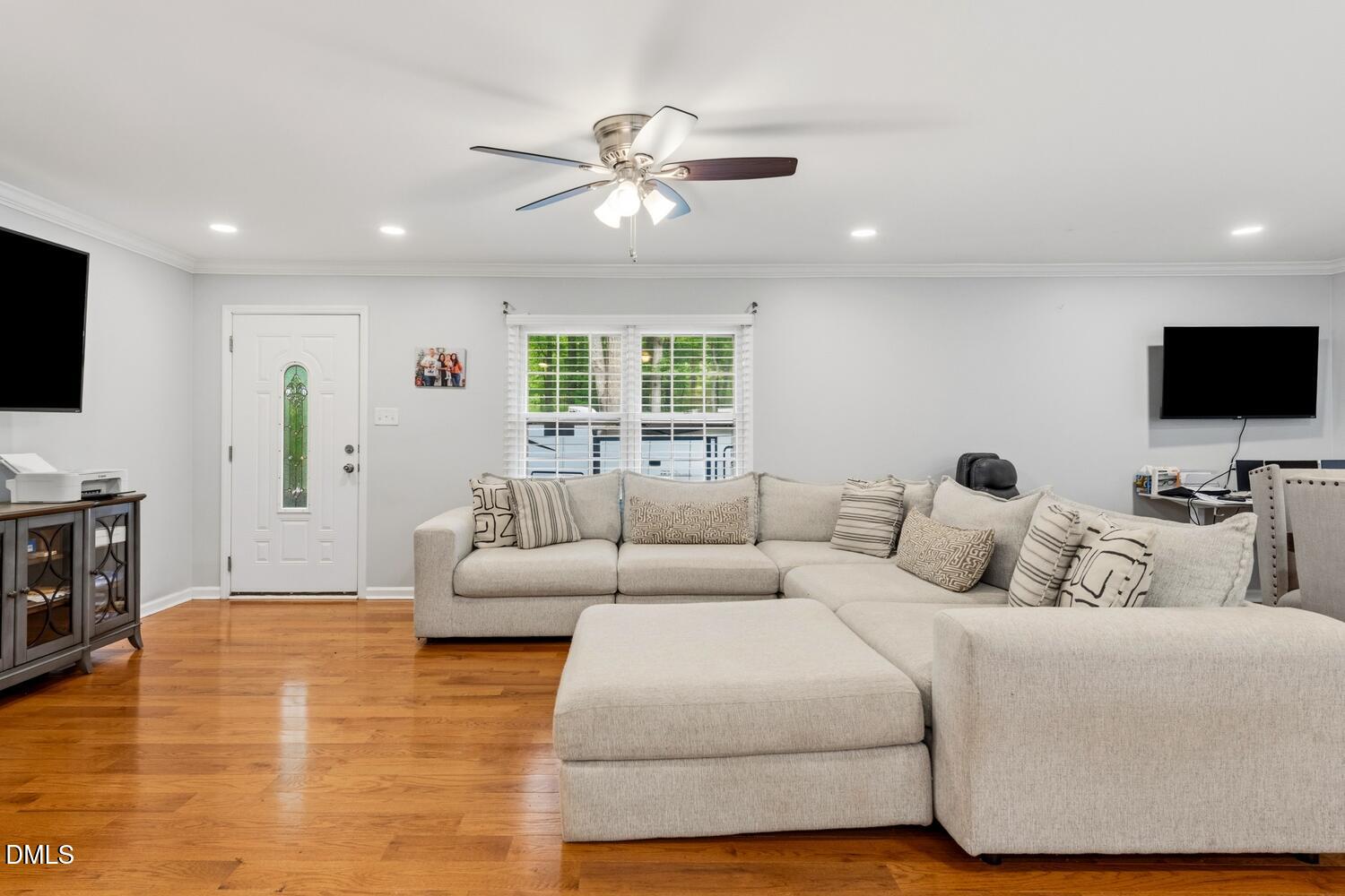 3200 Seven Springs Road Hillsborough, NC 27278 - Photo 3 of 37 a living room with furniture and a flat screen tv