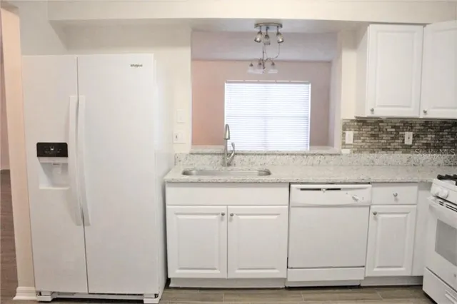 a view of a room that has a window in it