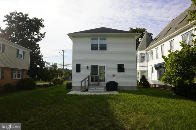 a view of backyard of a house