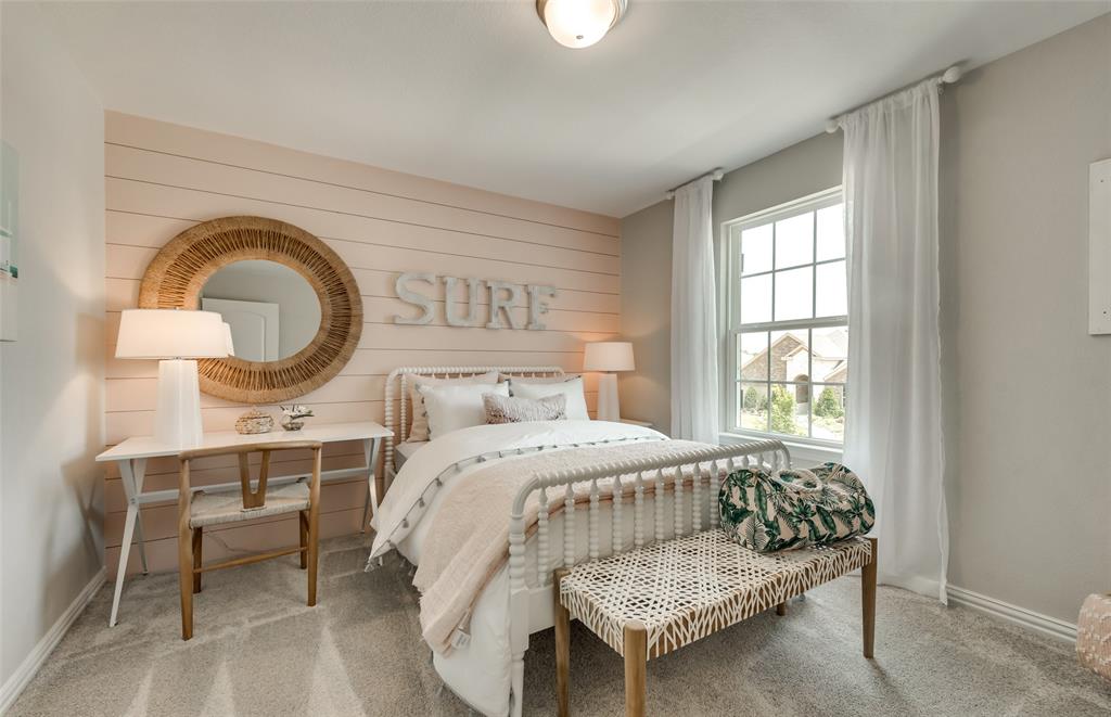 1608 Kendell Street Anna, TX 75409 - Photo 22 of 28 a bedroom with a bed chair and a window