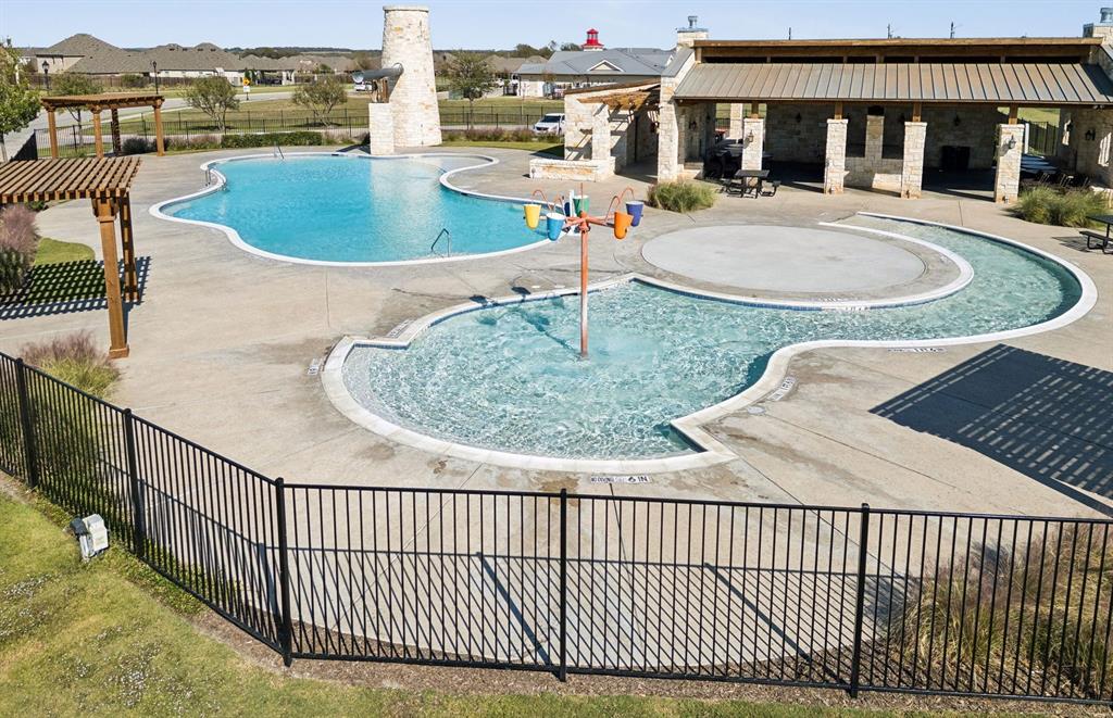 1608 Kendell Street Anna, TX 75409 - Photo 26 of 28 a view of a house with swimming pool and porch